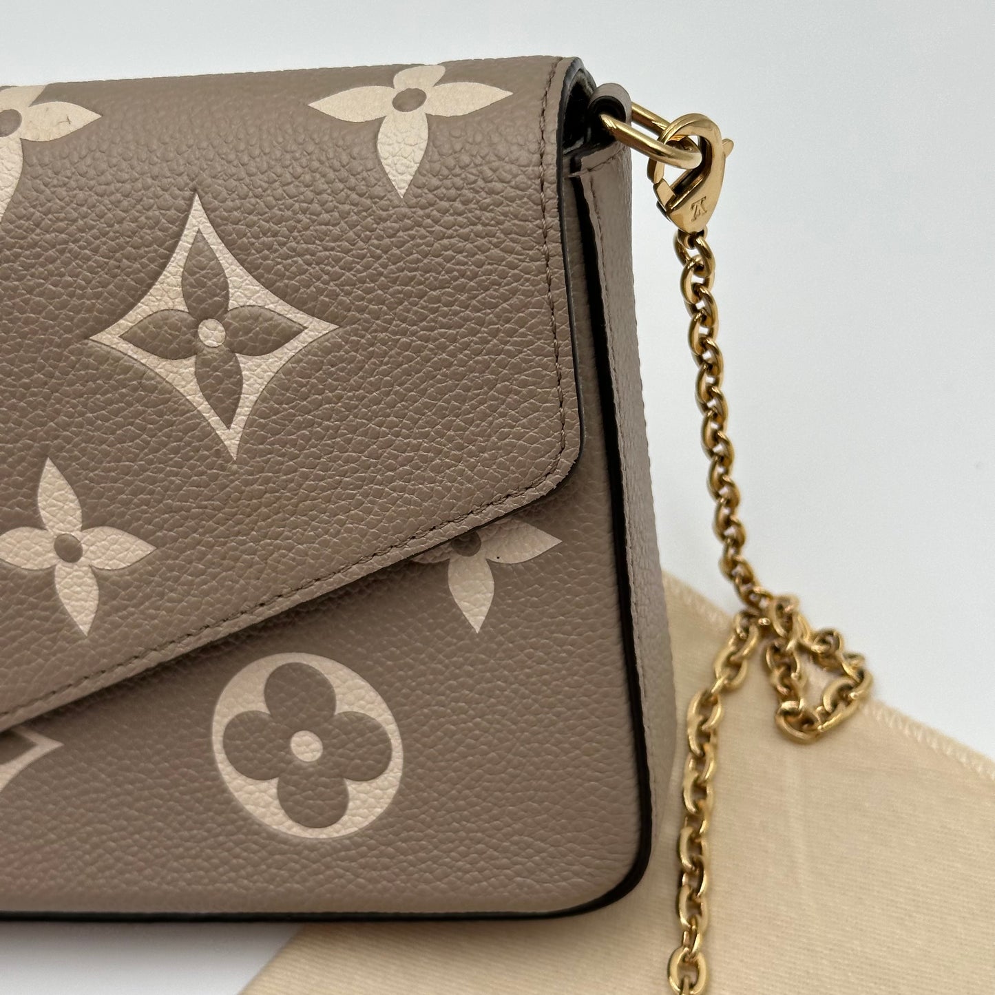 Authentic Louis Vuitton Turtledove Empreinte Felicie Pochette Crossbody