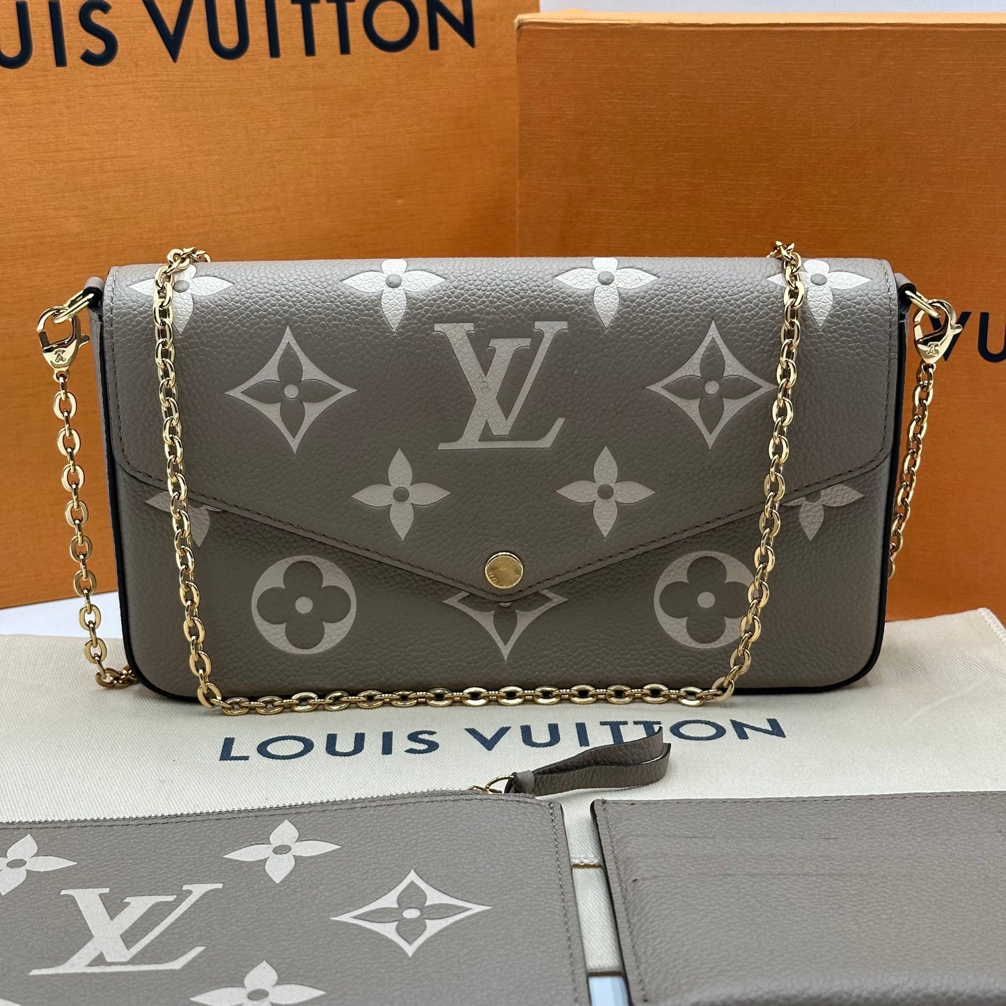 Authentic Louis Vuitton Turtledove Empreinte Felicie Pochette Crossbody