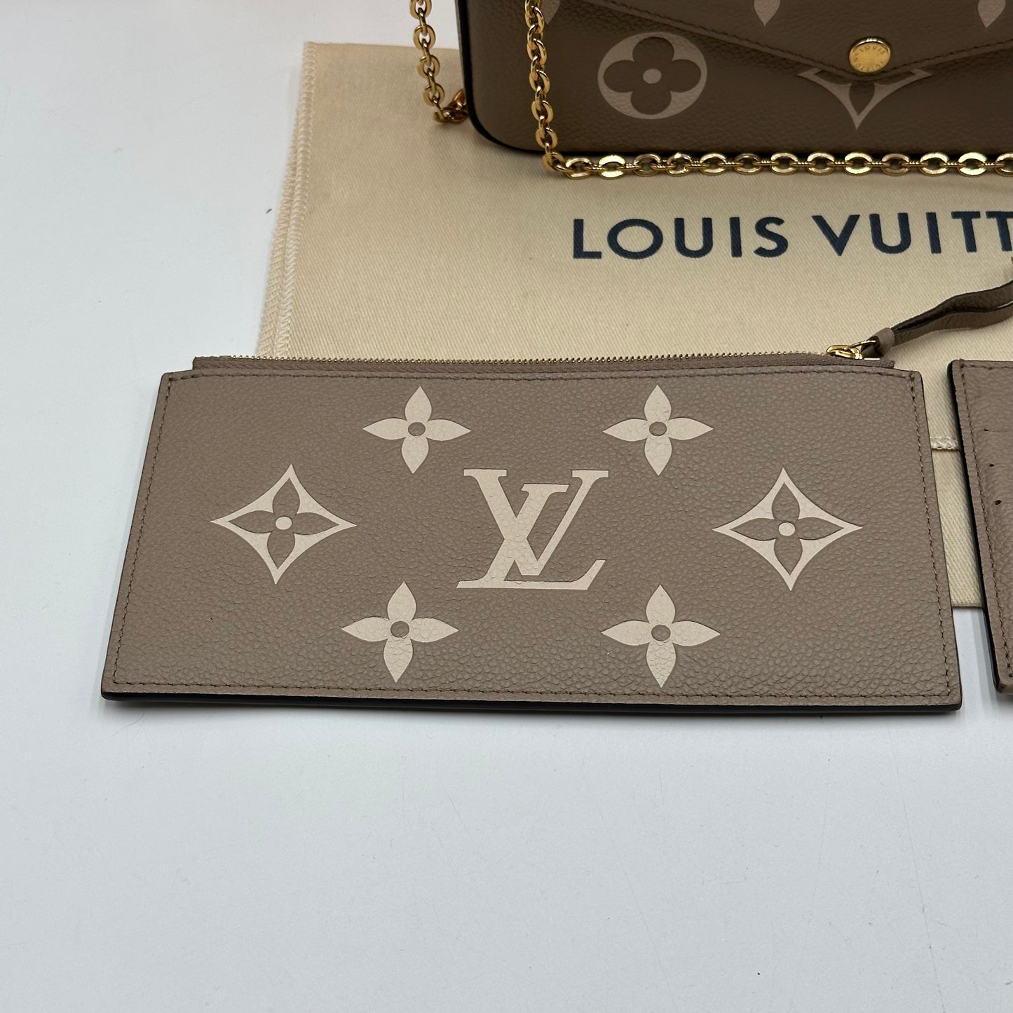 Authentic Louis Vuitton Turtledove Empreinte Felicie Pochette Crossbody