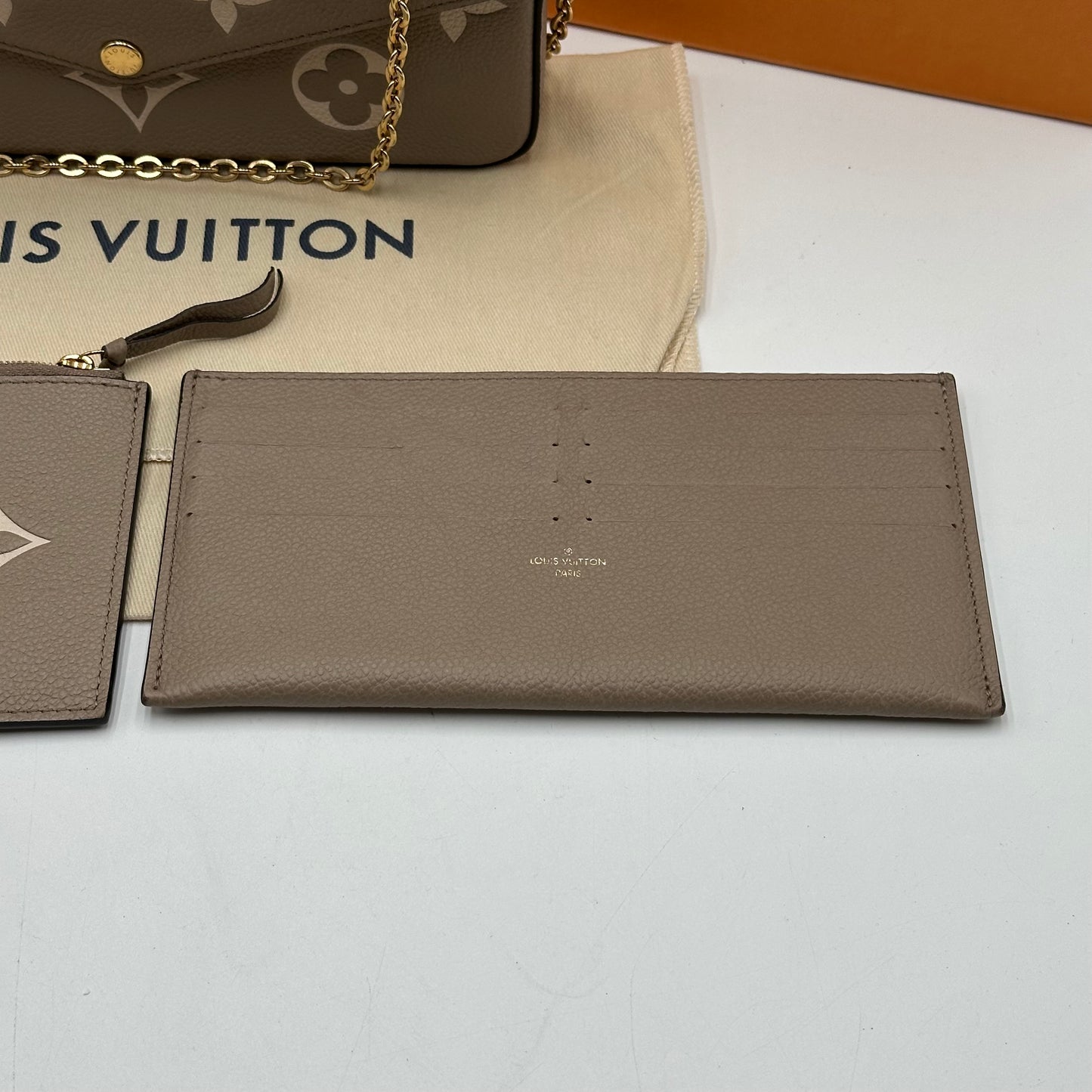 Authentic Louis Vuitton Turtledove Empreinte Felicie Pochette Crossbody