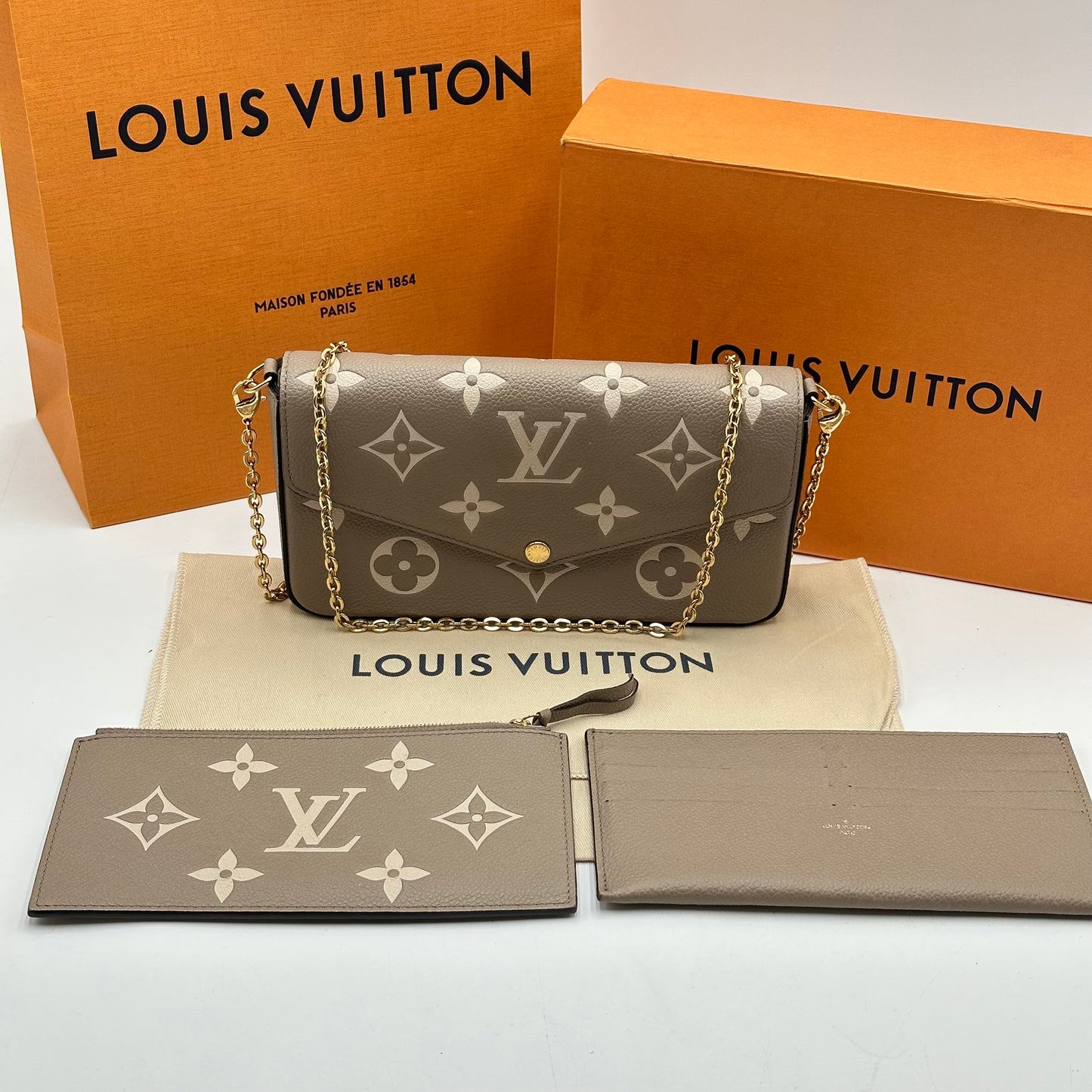 Authentic Louis Vuitton Turtledove Empreinte Felicie Pochette Crossbody